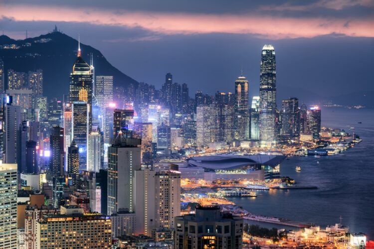 Aerial view of skyscrapers in downtown of Hong Kong at sunse