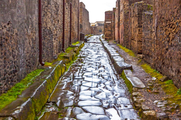 Paved street at the ancient Roman city of Pompei, Italy.