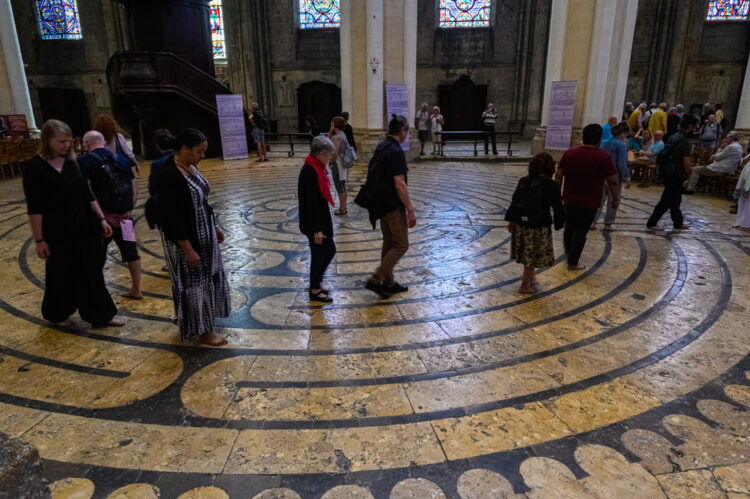 Worshippers walk the maze on the floor of the cathedral of Our Lady of Chartres