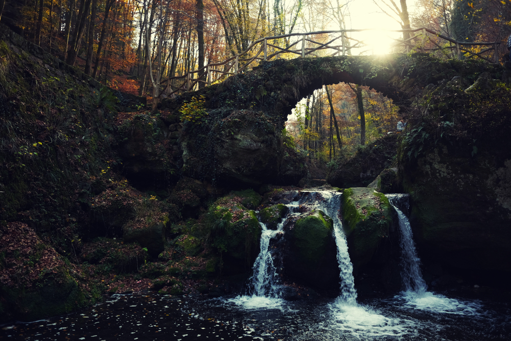 Schiessentumpel Waterfall in Luxembourg. Mullerthal trail in autumn