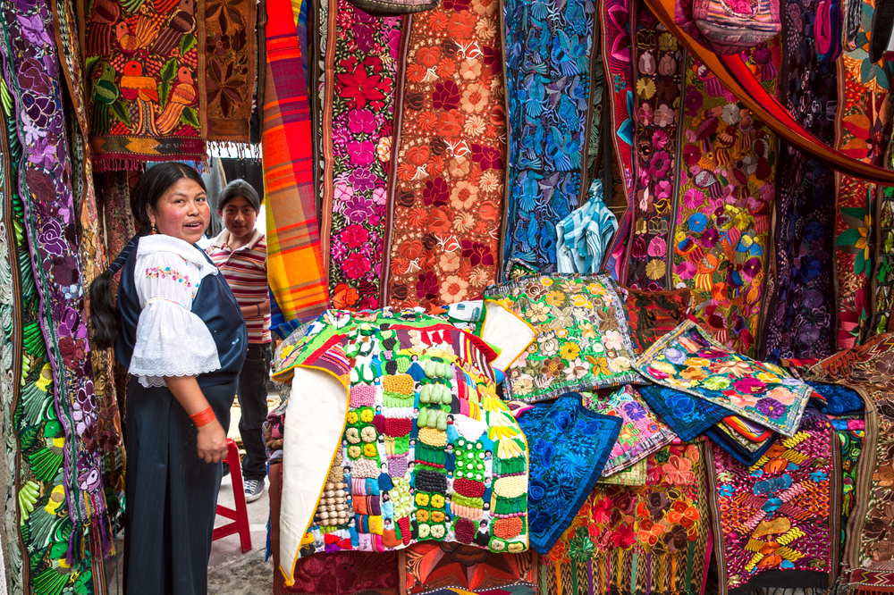  Indian women in national clothes sells the products of her weaving, as usual on weekdays 