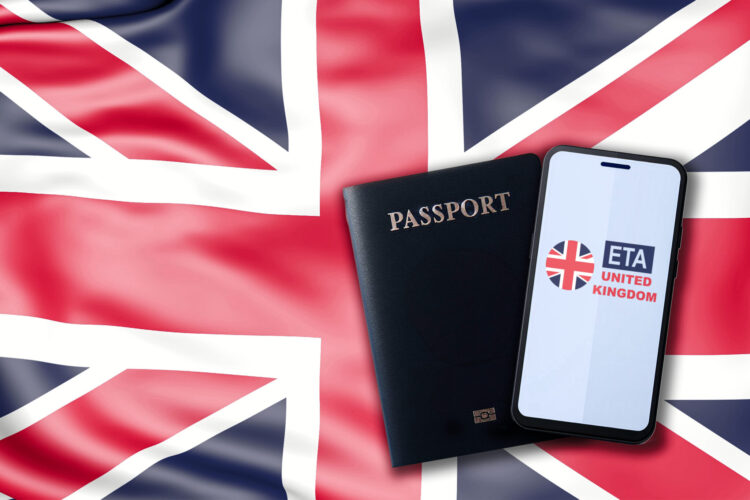 Close-up of a smartphone displaying ETA or Electronic Travel Authorization alongside a passport, set against the British or UK flag background.