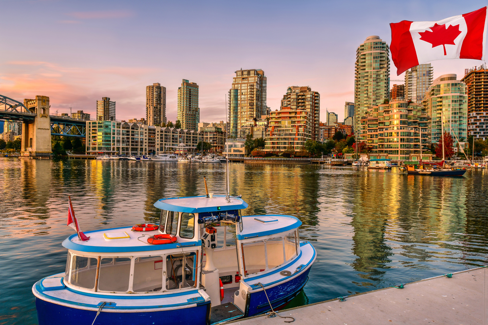 Ferry boat docked along in Granville island near Burrard Street Bridge