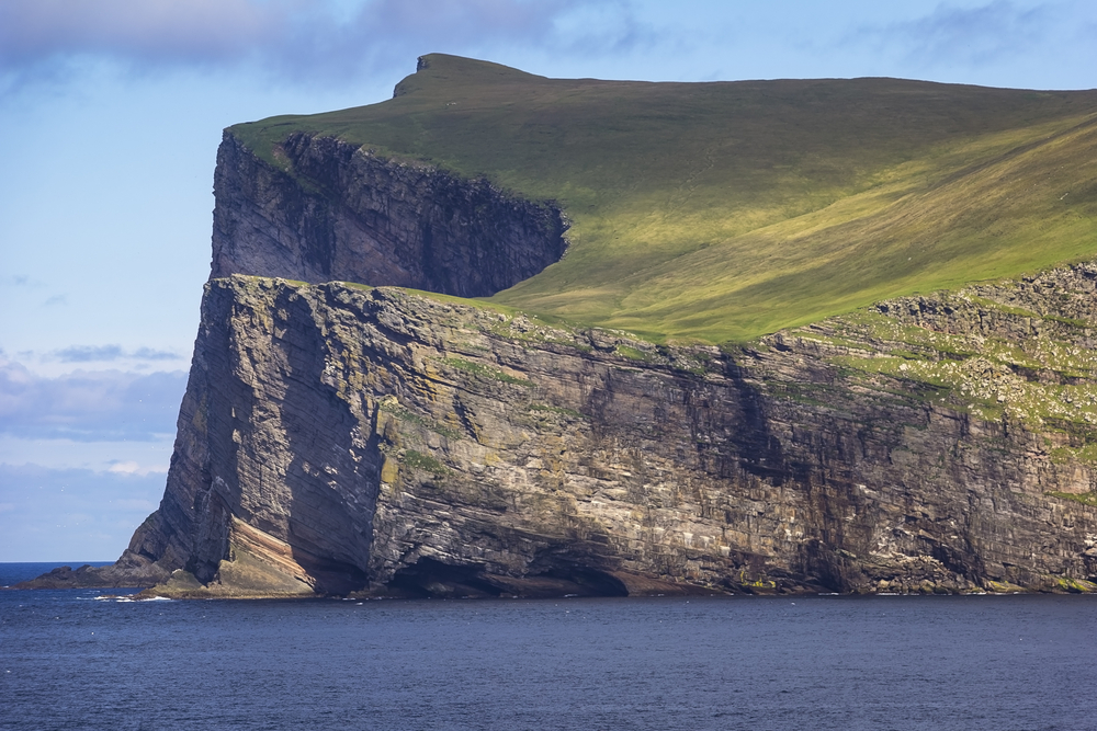 Cliffs on Foula in the Shetland archipelago of Scotland, is one of the United Kingdoms most remote permanently inhabited islands.