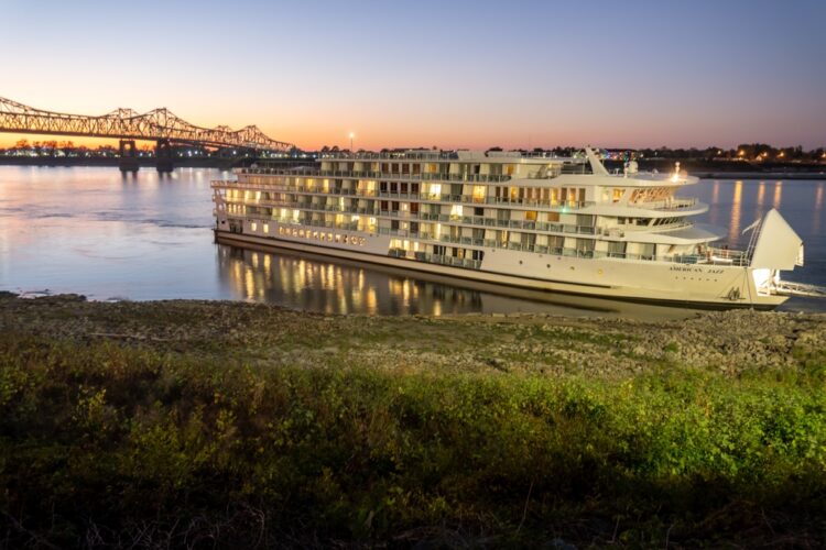 River cruise ship "American Jazz" at sunset on the Mississippi