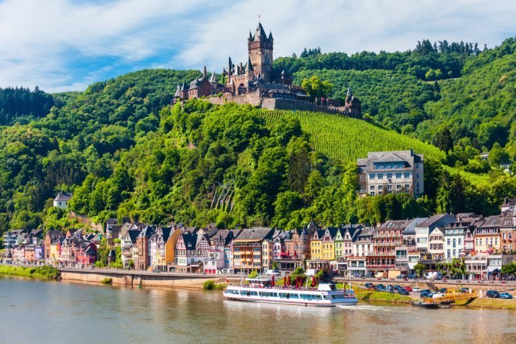 What’s More Important To You? A Balcony Stateroom Or Savings? Reichsburg Castle aerial panoramic view in Cochem in Moselle valley,
