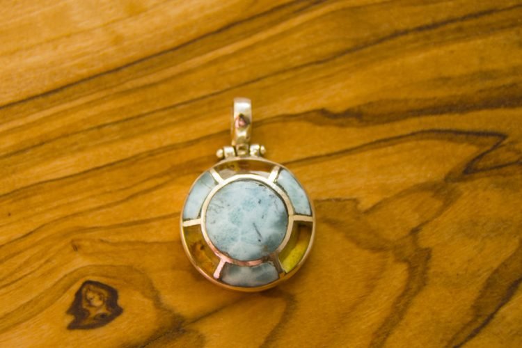 Exploring the Dominican Republic’s Amber and Azure Stone Treasures Pendant with blue Dominican Amber