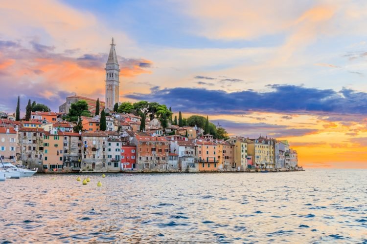 The Best Seaside Cities in Istria, Croatia Rovinj, Croatia. Sunset view of old town on the western coast of the Istrian peninsula.