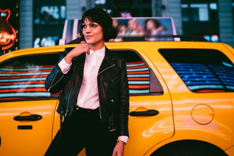 Solo female traveler with a taxi