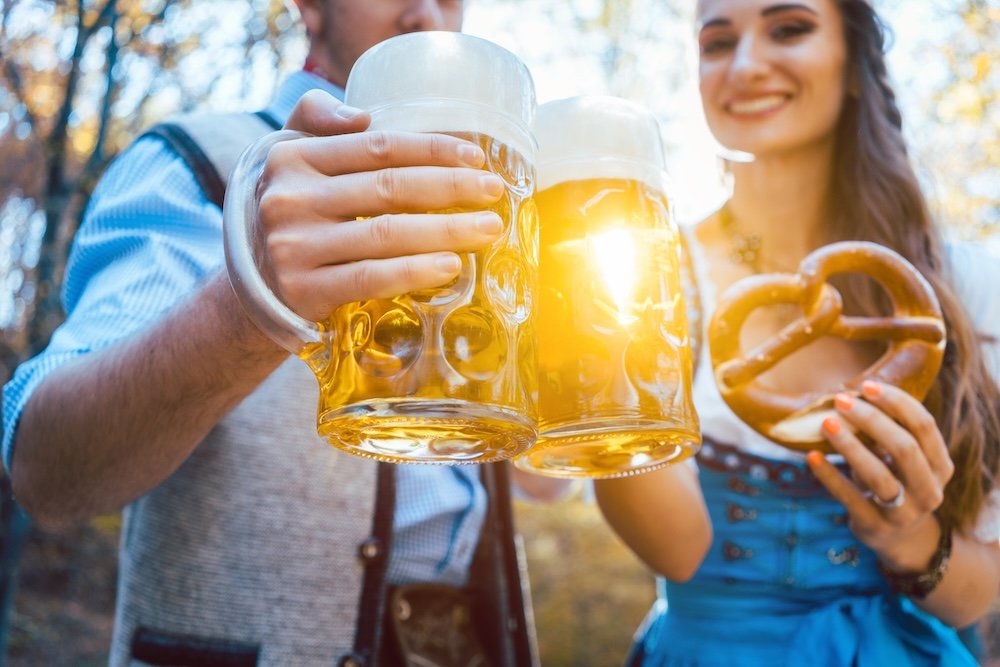Couple toasting with beer in Bavaria