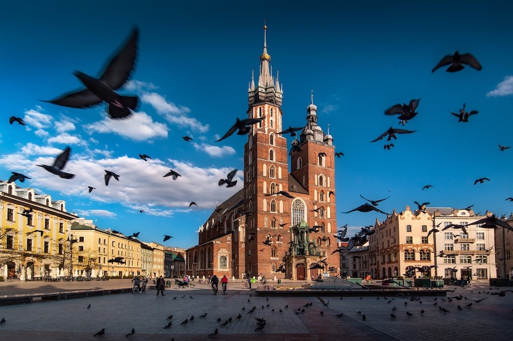 The main square in Krakow with a view of the cloth hall and St. Mary's Basilica.