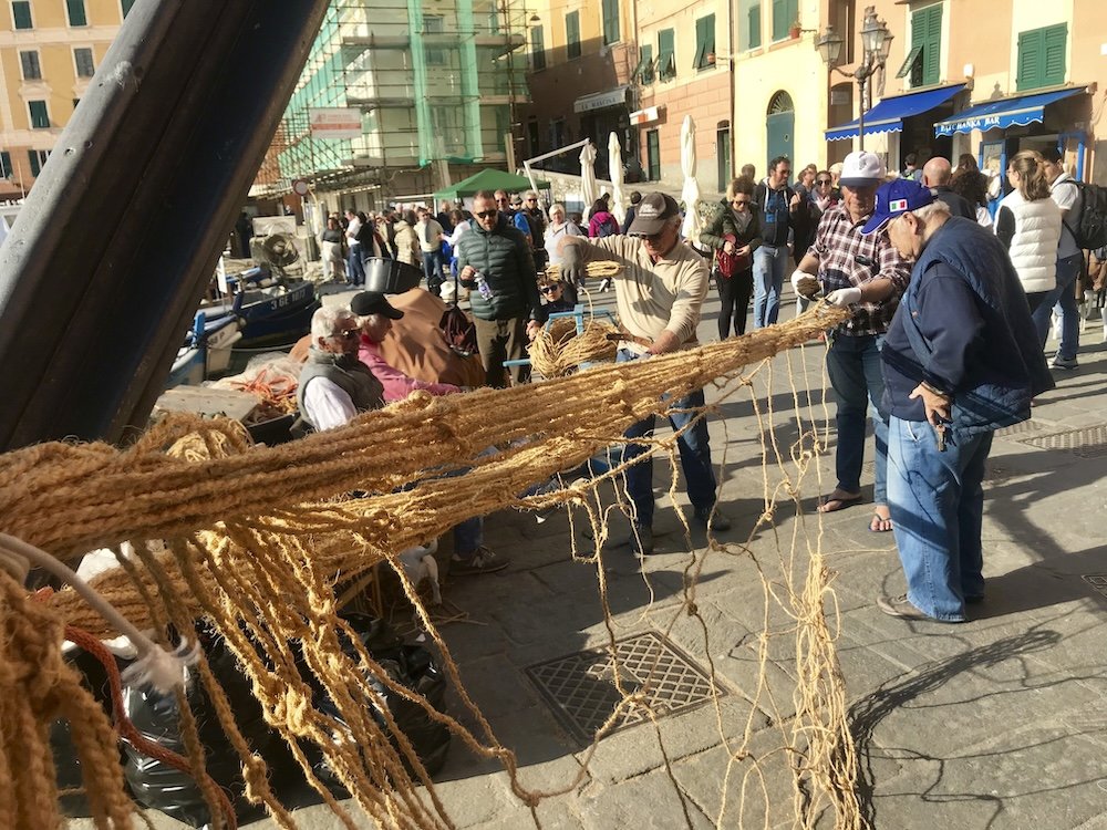 fishermen are setting up the fishing net for the tonnarella